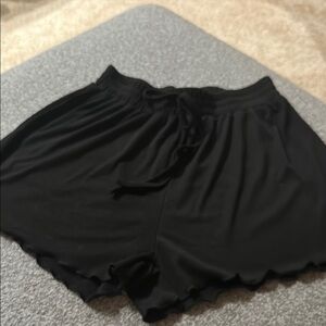 Black Ruffle Hem Shorts